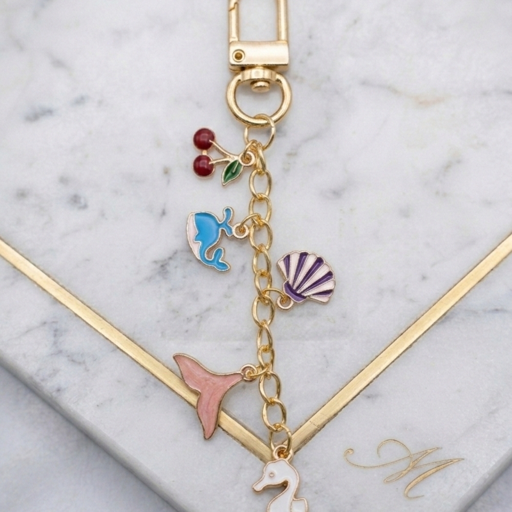 Charming Gold Keychain with Multicolor Charms